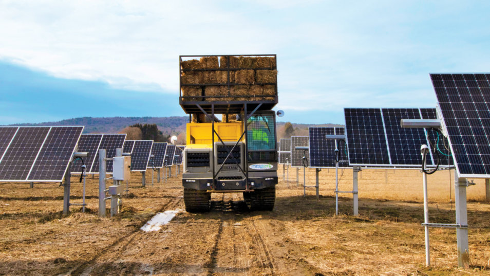 customized terramac carrier hauling hay on solar farm