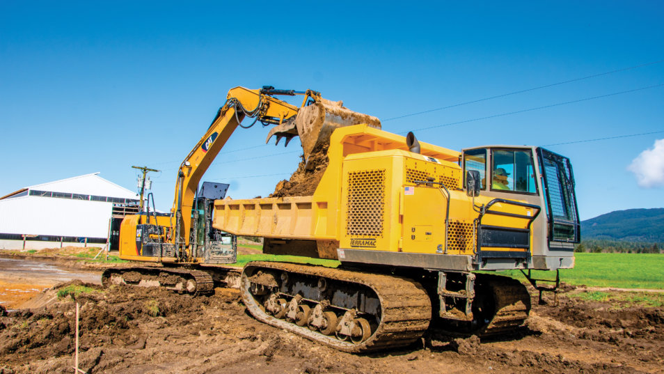 RT14R being hauled with dirt as it builds future dairy farm in Oregon