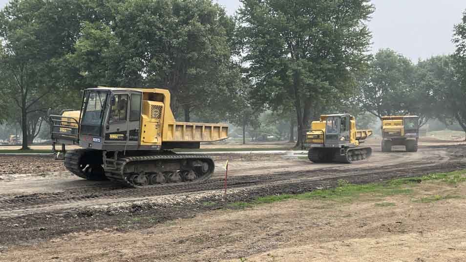 Multiple Terramac Carriers Hauling Material on Golf Course